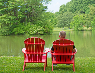 Lawn chairs by pond