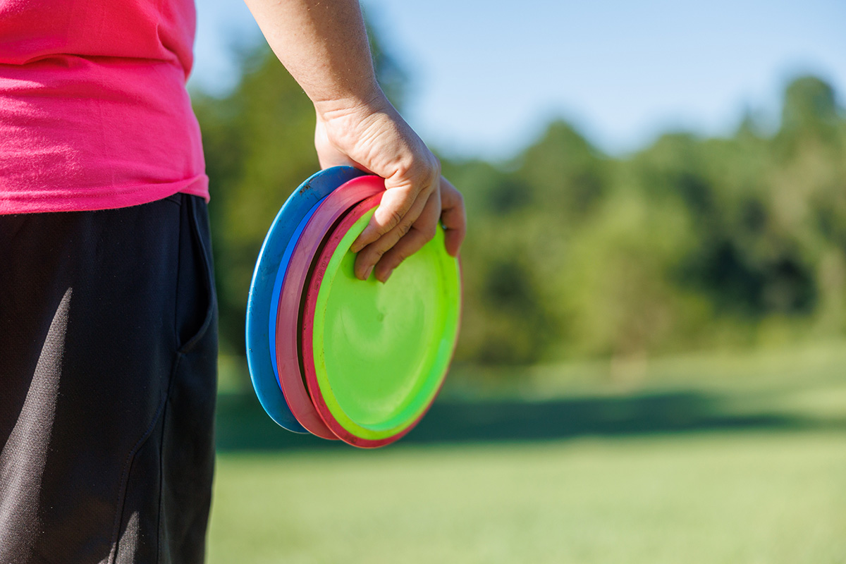 player holding discs